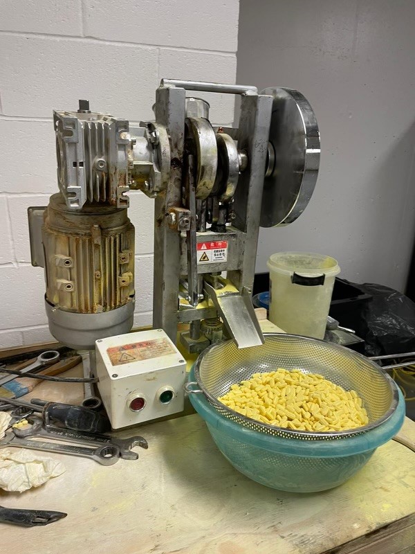 Industrial pill press machine seized by DEA used to produce counterfeit M30 fentanyl pills